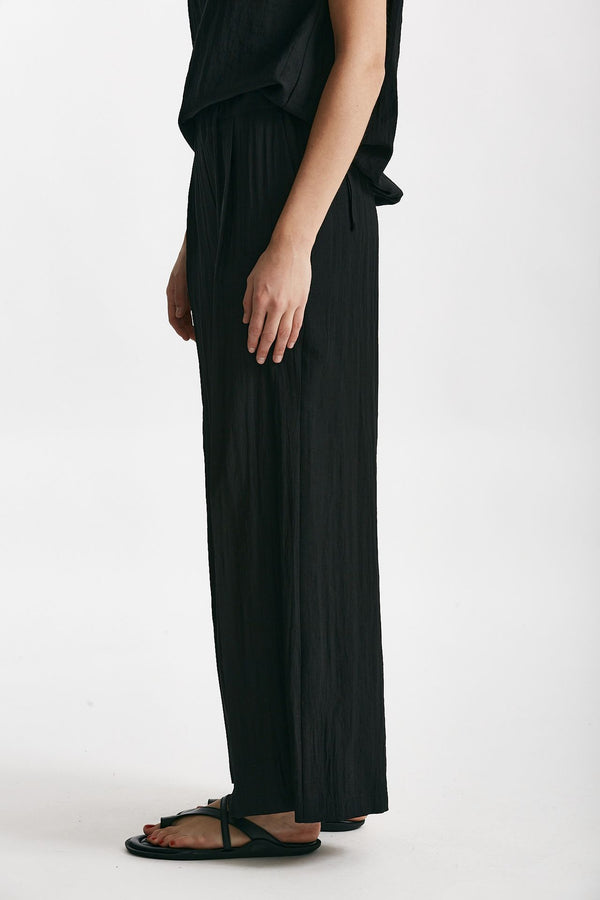 pantalone effetto stropicciato nero women ( p - s )